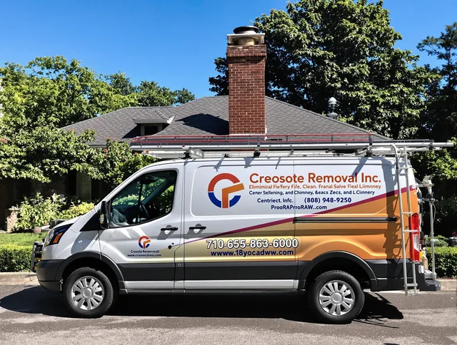 Paramount Chimney Sweep technician removing creosote safely in Paramount, CA